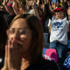 Nina Porter, left, prays with her daughter Genesis while Lou Engle speaks. 
Patty Miller, from Owego, NY, prays during the “A Million Women” rally on Saturday, Oct. 12, 2024. 

