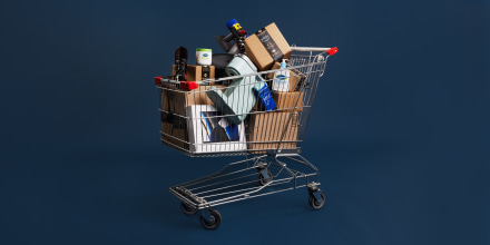 A shopping cart filled with boxes and products