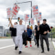 Striking Boeing workers picket outside the Boeing Co. manufacturing facility