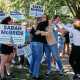 Sarah McBride hugs a supporter.