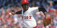 Luis Tiant pitches with the Boston Red Sox in the 1970s.