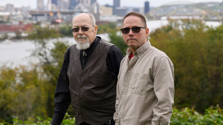 Jim Copenhaver, 74, and David Dutch 57, pose for a photo